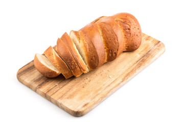 Sliced bread on a wooden chopping board