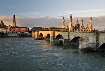 Old stone bridge across Ebro river in Zaragoza