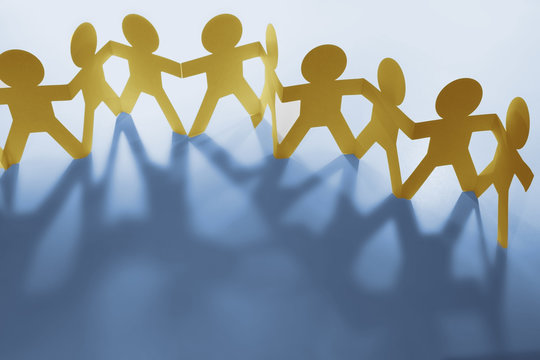 Team holding hands together