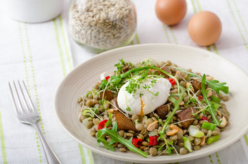 Lentil salad with poached egg