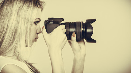 Photographer girl shooting images