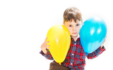 little boy with colorful balloons