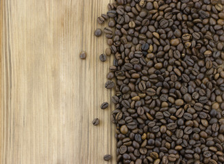 Coffee beans on wooden background