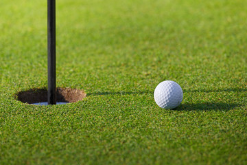 Golfball going to hole
