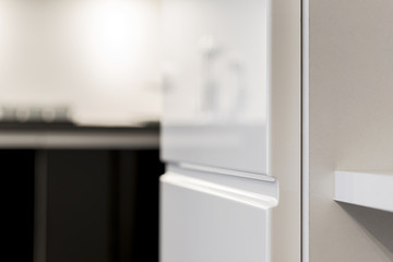 Detail of white kitchen cupboard