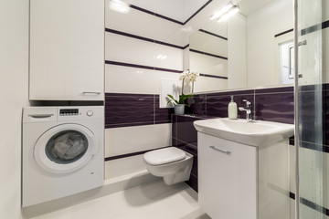 Modern bathroom in violet style