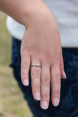 white gold diamond wedding ring on brine's hand