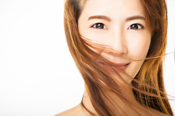 Obraz premium beautiful young woman with the flying hair