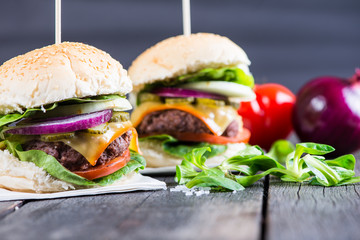 traditional pub style burger  on wooden table