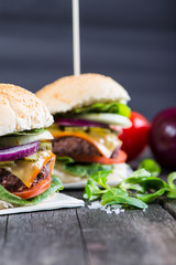 traditional pub style burger  on wooden table