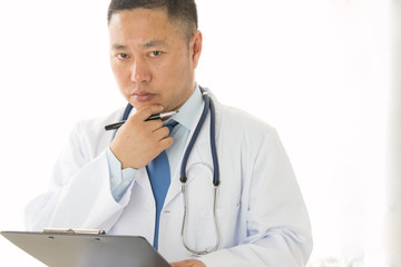 Asian male doctors at work