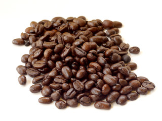 Brown coffee beans isolated on white background