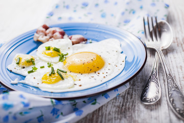 fried eggs with bacon
