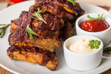 Grilled pork ribs in barbecue sauce