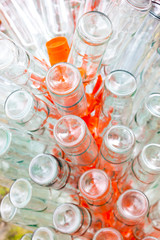 empty bottles of wine on rack