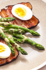 boiled green asparagus with bacon, egg and mustard dip