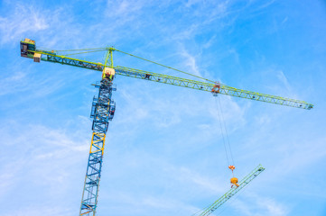 Building construction industrial with construction tower cranes