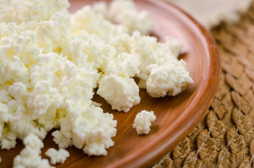 curds on the brown plate
