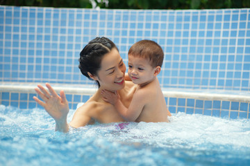 Family in jacuzzi