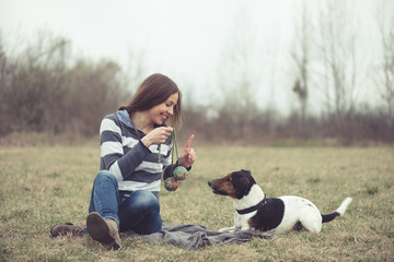 Woman having fun with her dog