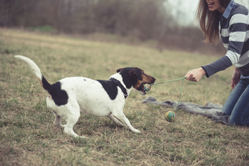 Woman having fun with her dog