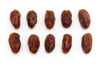 Medjool dates isolated on a white background.