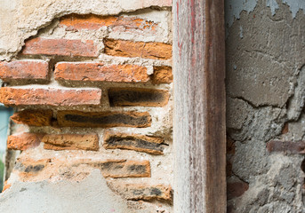 Damaged old brick wall