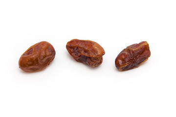Medjool dates isolated on a white background.