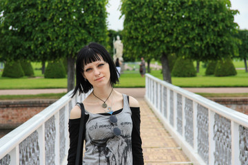 Girl  in Peterhof's England garden