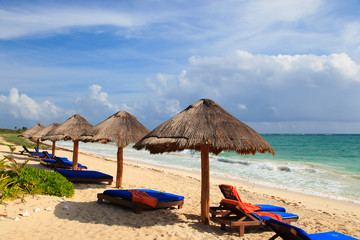 Beach chairs on exotic tropical sand beach