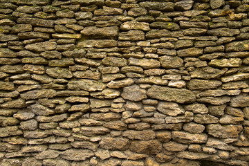 Wall of small stones limestone