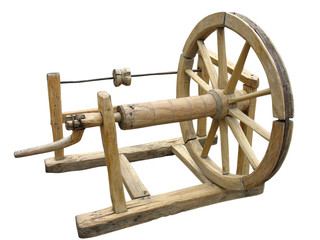 Old wooden spinning-wheel distaff isolated