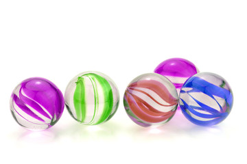 Colorful glass marbles isolated on white background