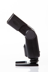 Photo camera flash isolated on white