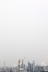 Fototapeta na wymiar Smokestack, grey sky, emission, industry