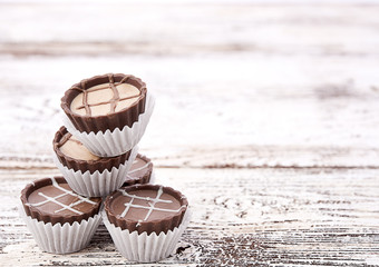 Dark chocolate on wooden background