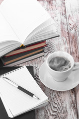 Cup of coffee on a wooden table