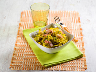 butterfly pasta with speck zucchinis saffron