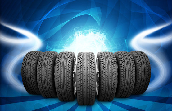 Wedge of new car wheels. Abstract background is lines and