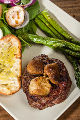 Steak and mushrooms with asparagus