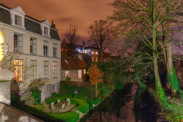 Fototapeta na wymiar Picturesque night canal in Bruges, Belgium