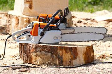 Naklejka premium Orange chainsaws