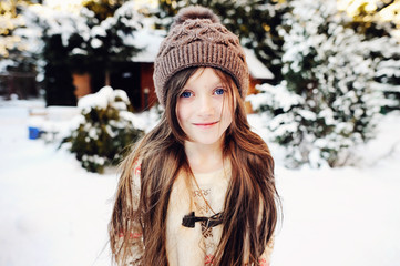 Adorable kid girl in winter