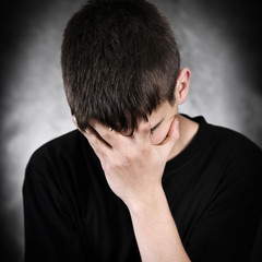 Fototapeta premium Sorrowful Young Man