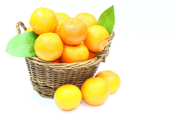 Mandarins basket on white background