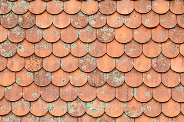 Old red clay roof tiles background