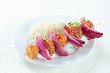Bacon and potato skewer with rice