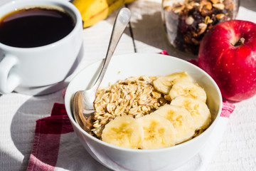 oatmeal with bananas, apples, nuts and dried fruit jar