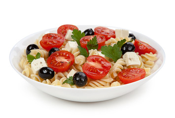 Pasta salad in the plate isolated on white background