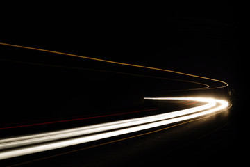 Car light trails in the tunnel.
